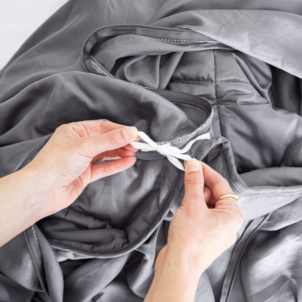 Sleep Heavy Ties to keep blanket in place